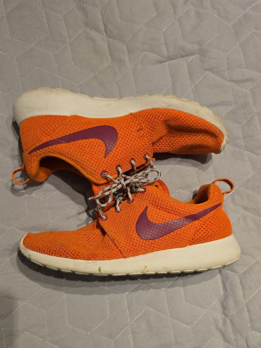Nike Orange Sneakers with Purple Swoosh